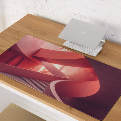 Premium abstract pink spiral gaming mouse pad with flowing red ribbons, non-slip base, stitched edges, large size