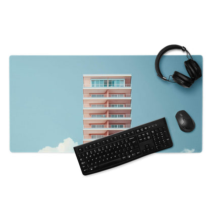 Pastel sky blue gaming mouse pad with pink white building and clouds