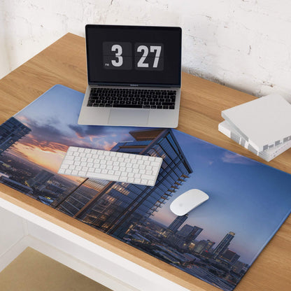 Blue cityscape desk mat with skyscrapers, sunset hues, non-slip gaming mouse pad