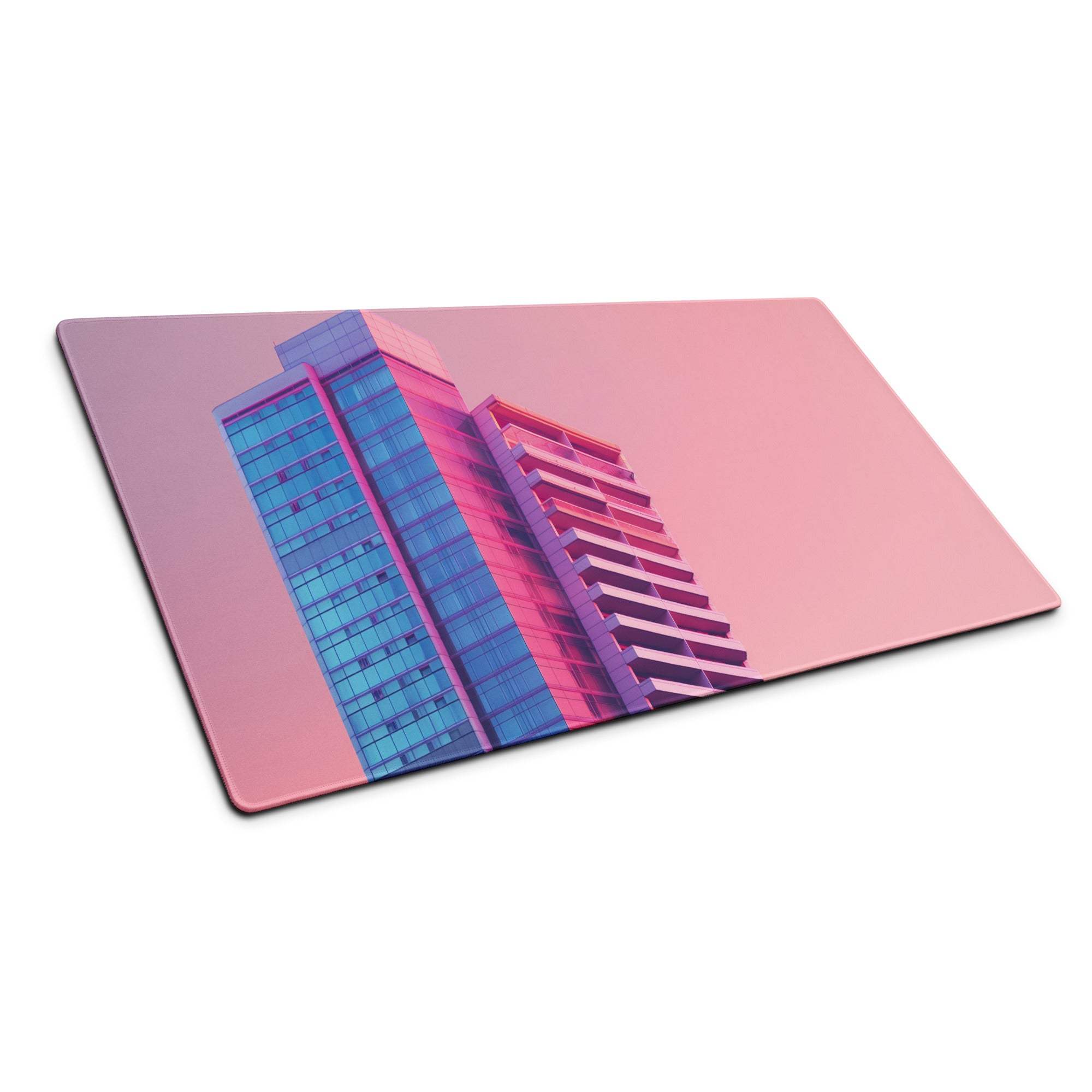 Neon pink blue cityscape high-rise on large gaming mouse pad cutting board view