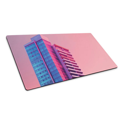 Neon pink blue cityscape high-rise on large gaming mouse pad cutting board view