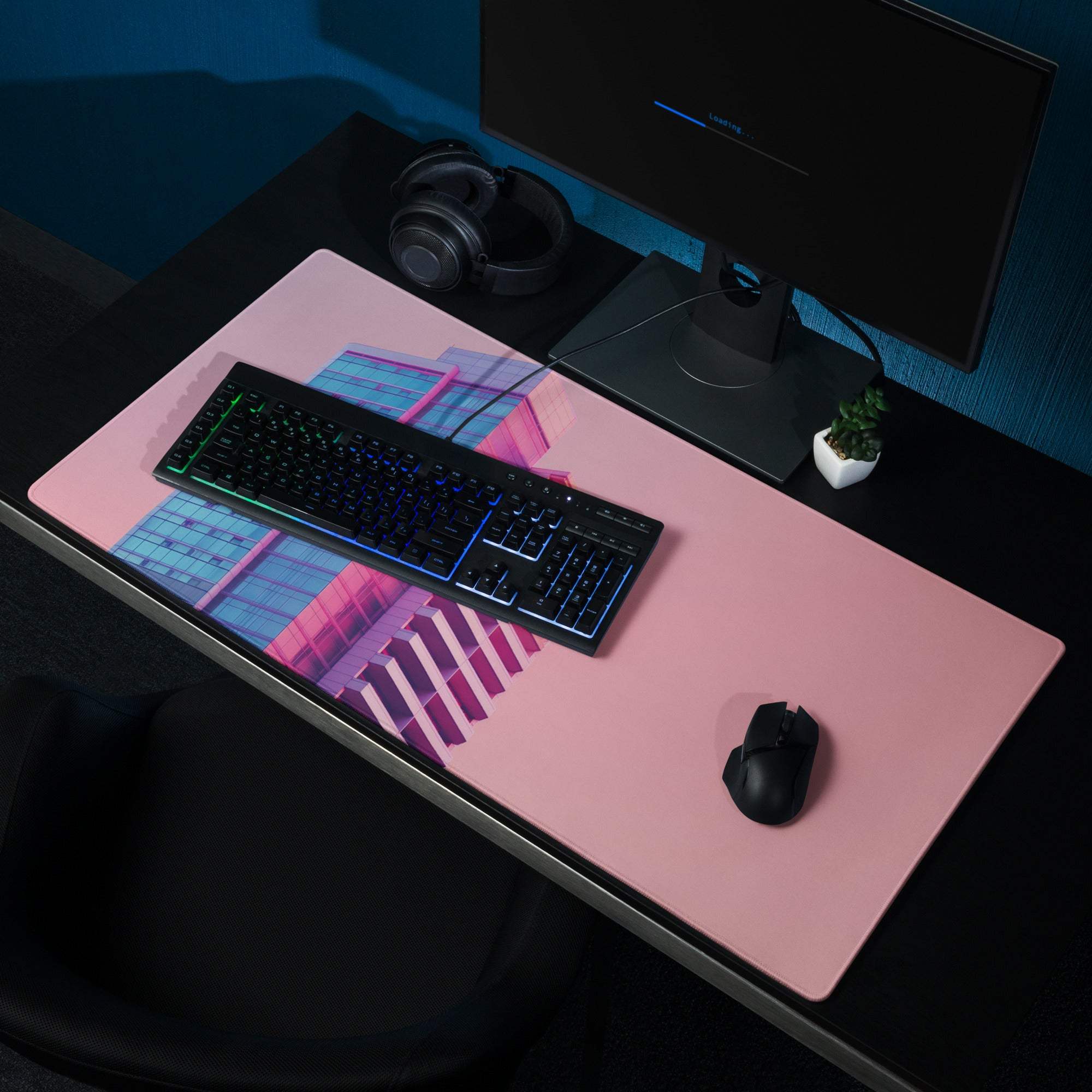 Neon pink gradient cityscape gaming mouse pad with purple blue geometric design