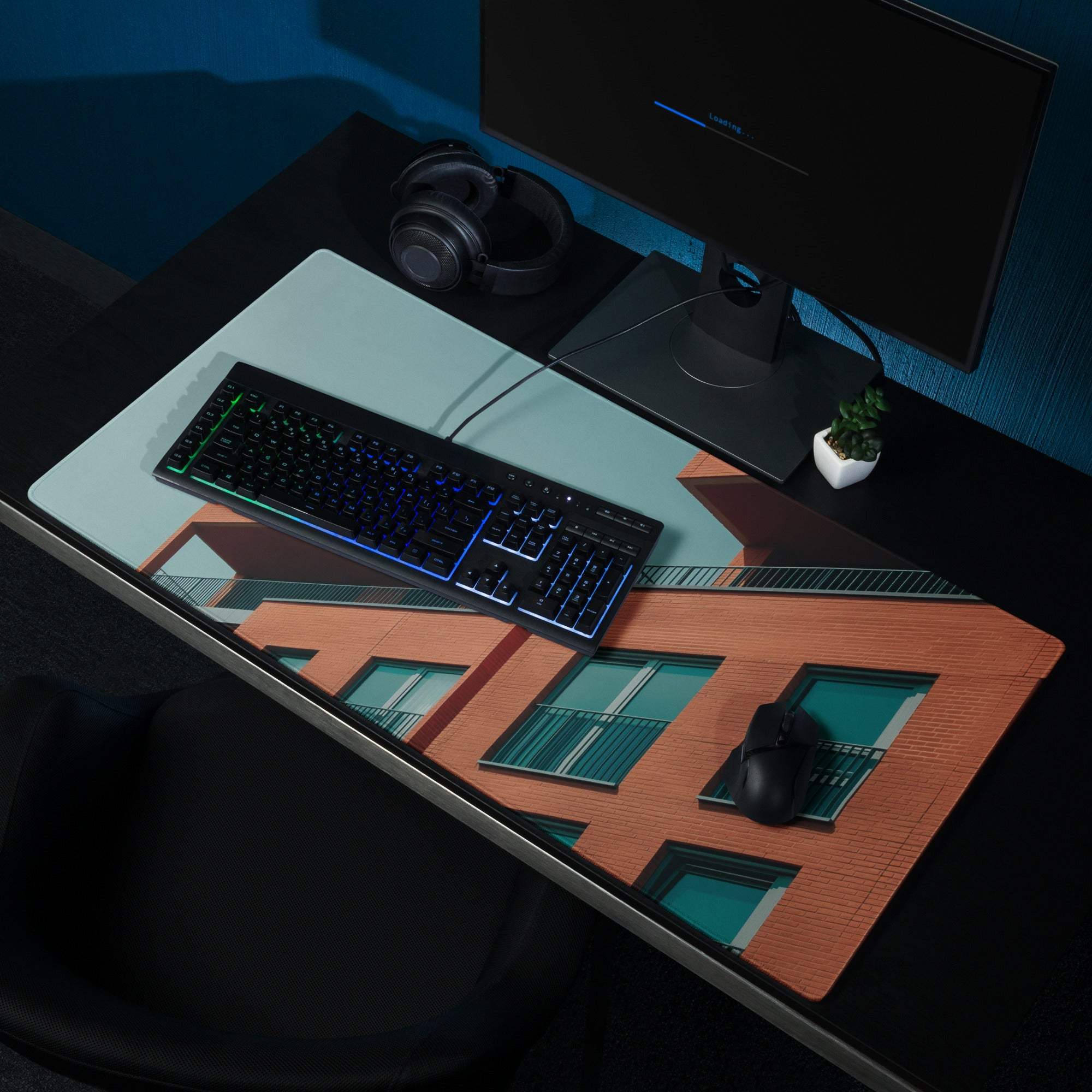 Sleek large edge-stitched gaming mouse pad with orange brick teal window design