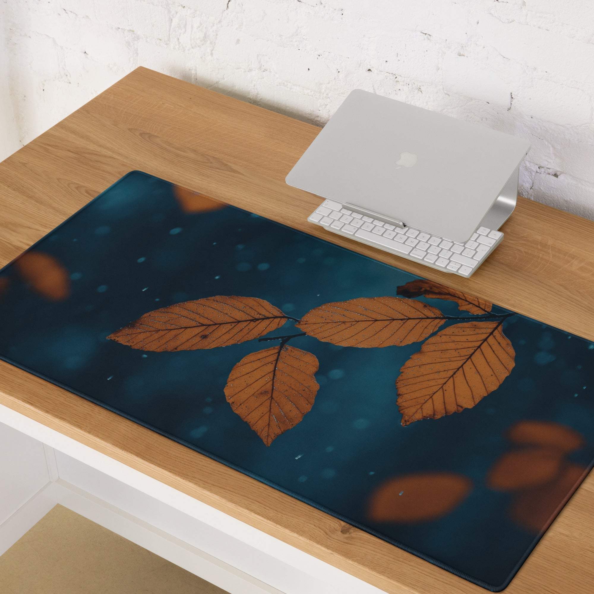 Nature-inspired autumn leaves on deep teal non-slip gaming mouse pad
