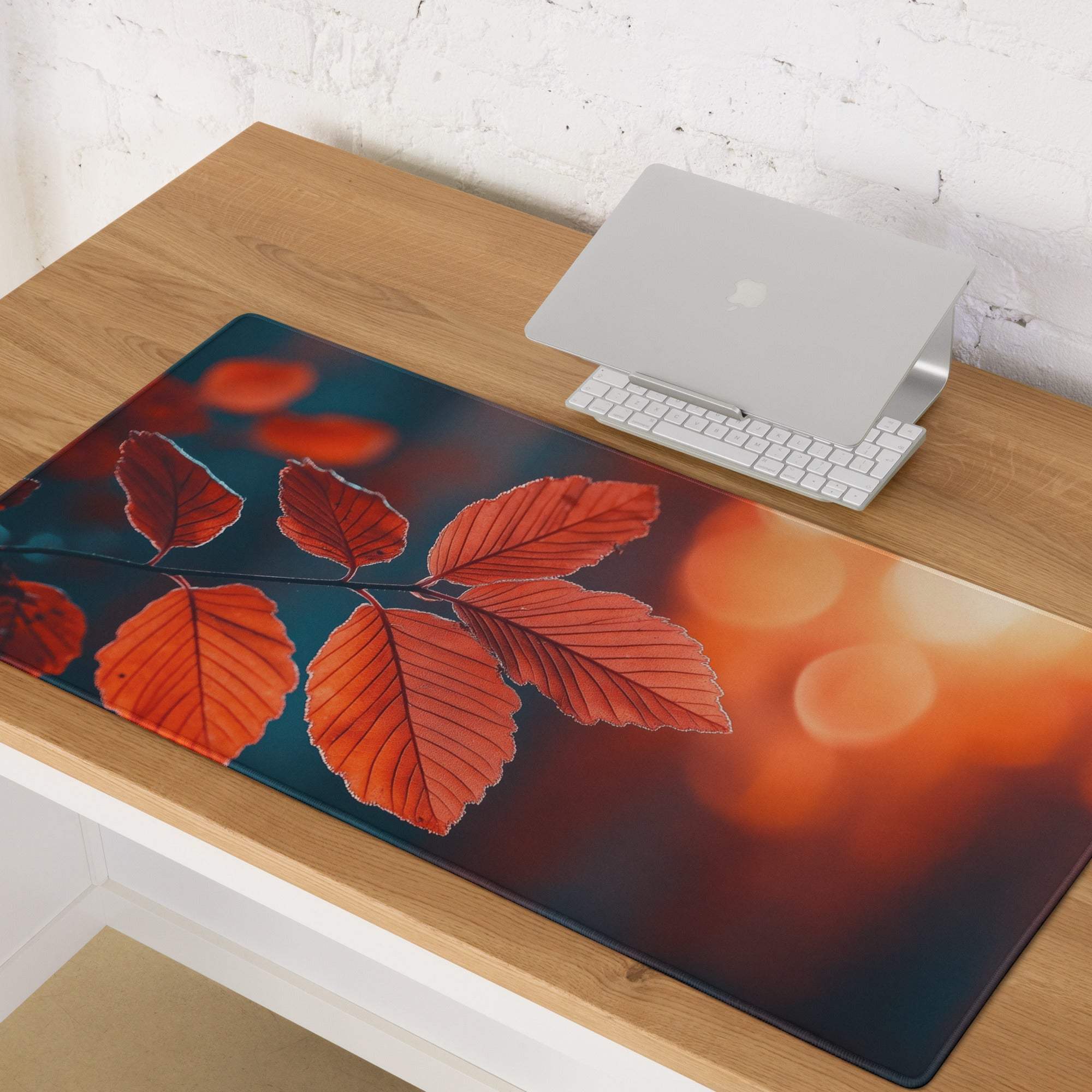 Autumn Leaves Warm Sunset large gaming mouse pad with orange leaves on teal-brown gradient