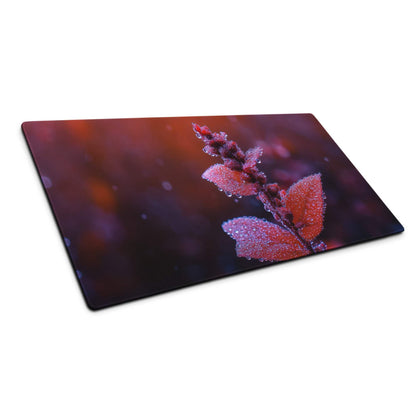 Frost-covered red leaf macro on large gaming mouse pad
