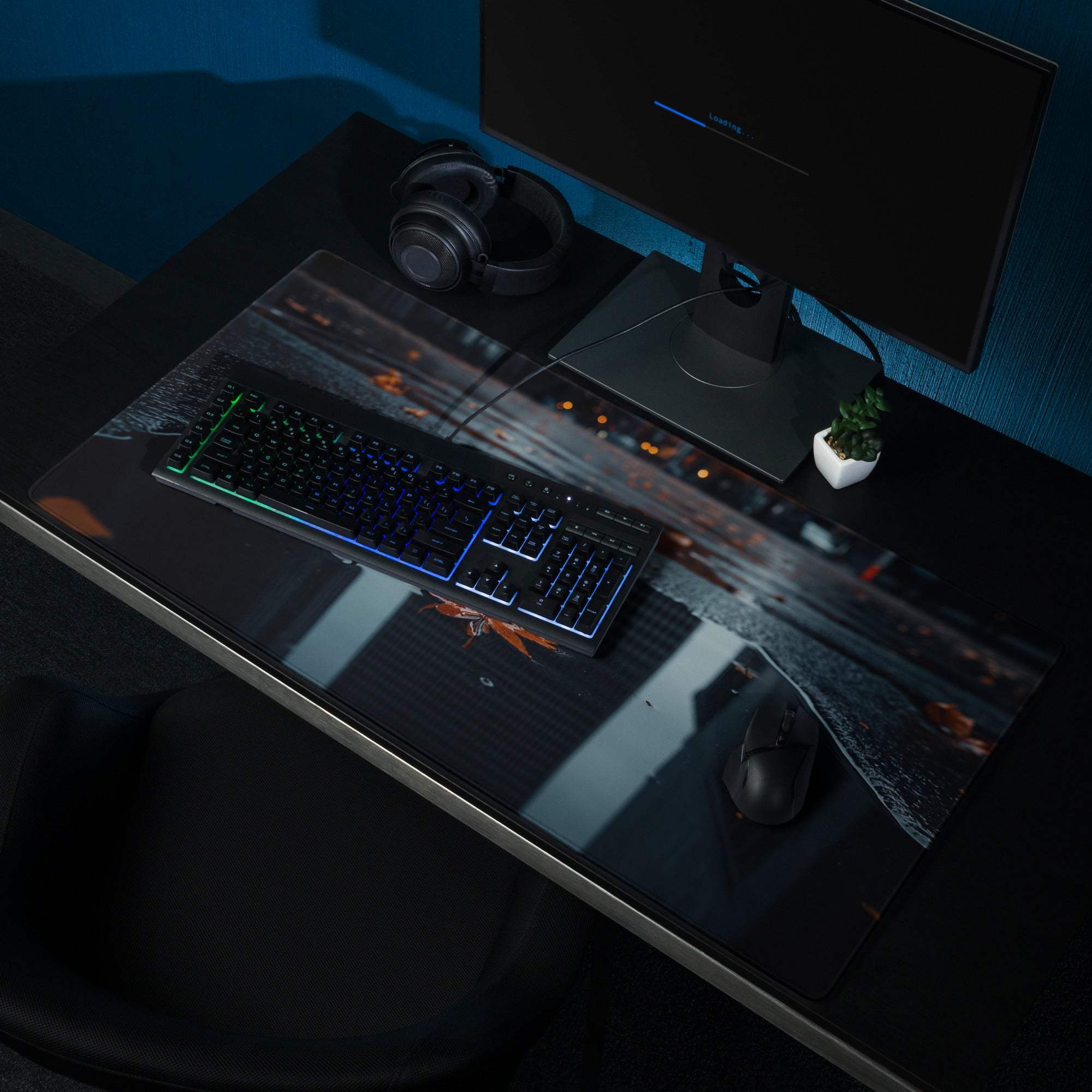 Black glossy gaming mousepad with neon cityscape, rain, orange leaves, edge stitch