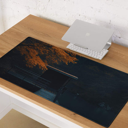 Black rectangular Moody Autumn Forest gaming mousepad with orange leaves
