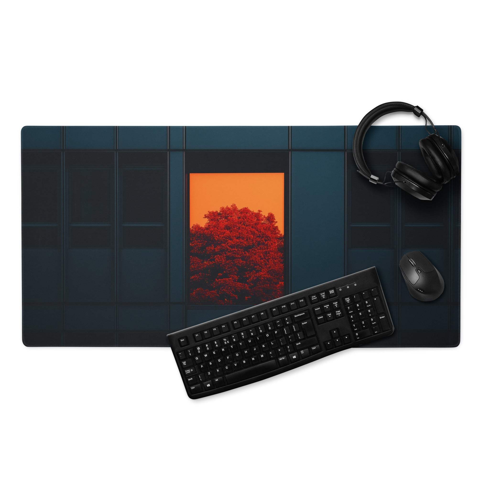 Modern dark blue gaming mouse pad with orange sunset window and red tree silhouette