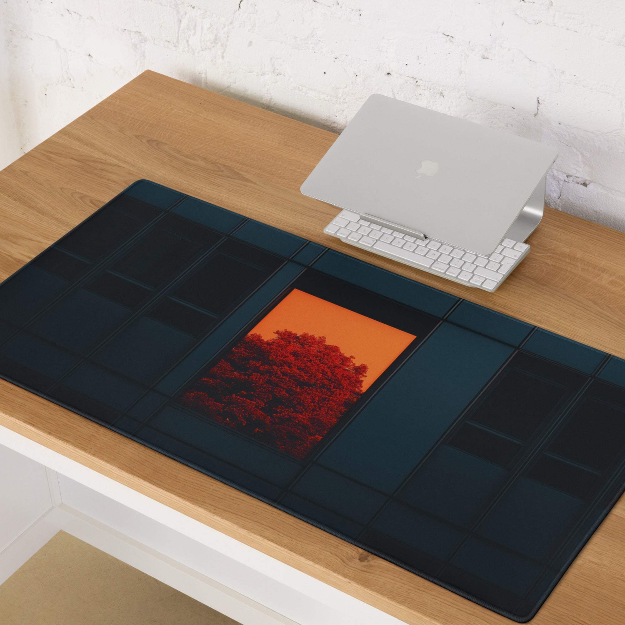 Modern dark blue gaming mouse pad with orange window red foliage accent