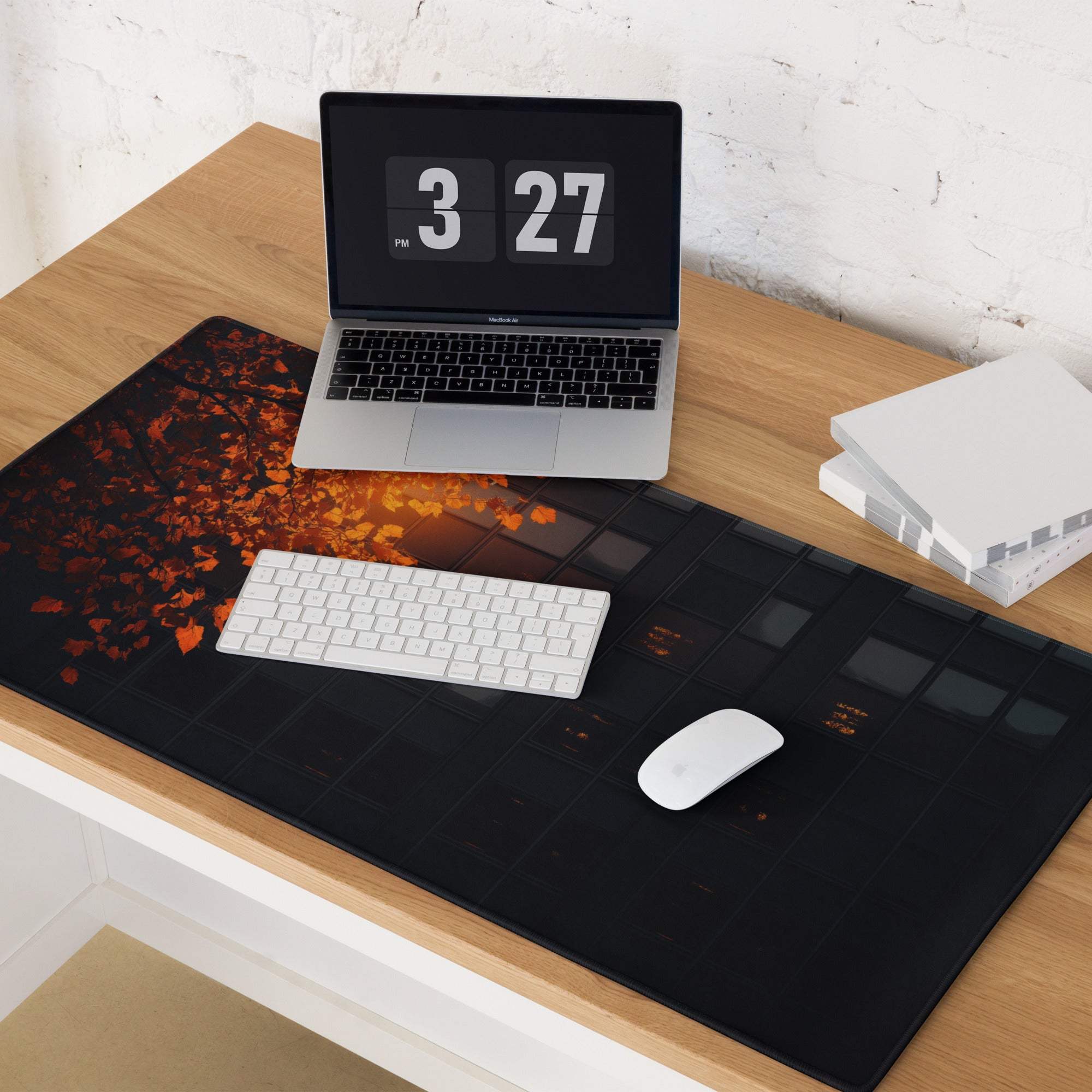 Black mat with autumn leaf design and non-slip backing