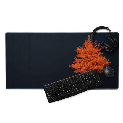 Black rectangular gaming mousepad with vibrant orange autumn tree design