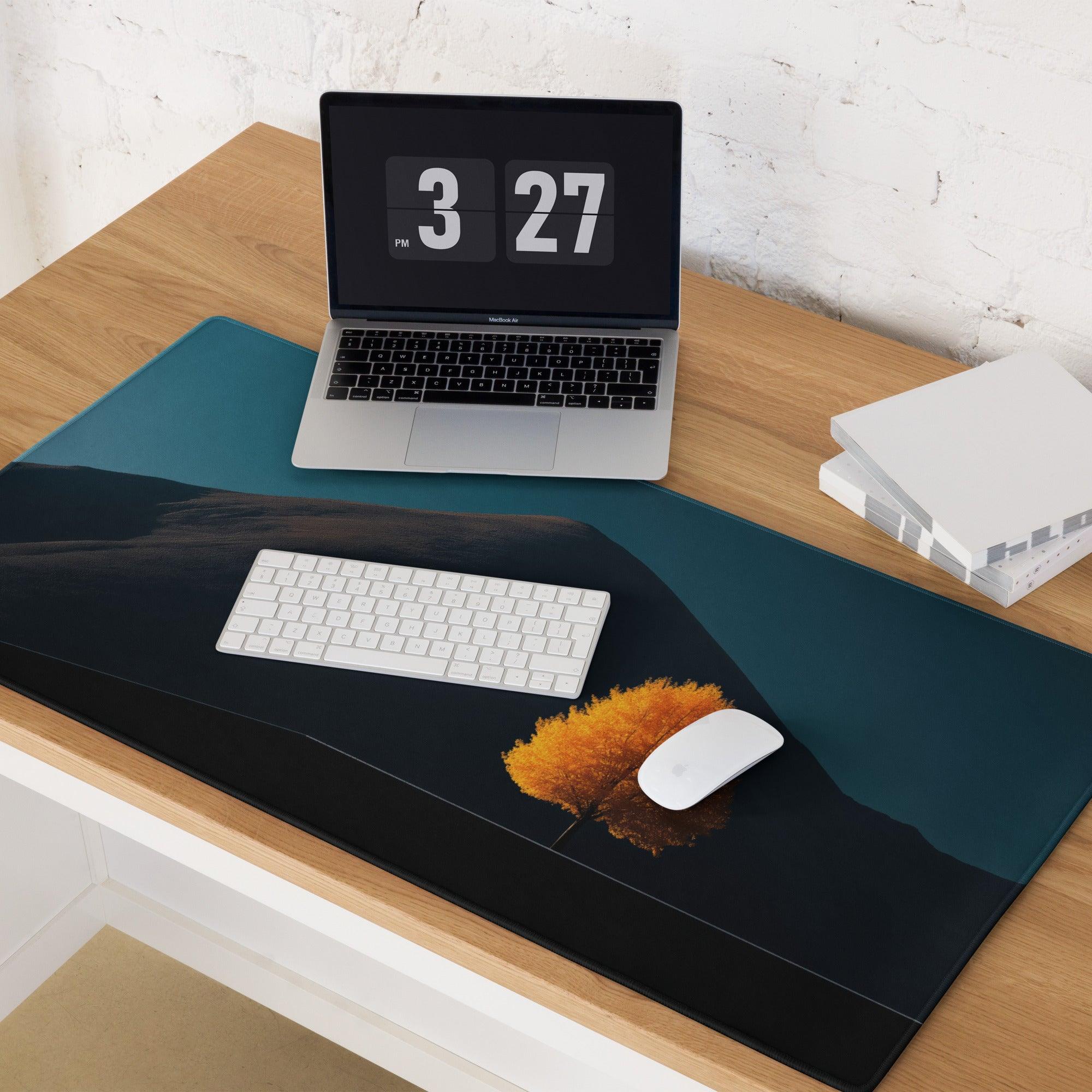 Sleek dark teal black gradient desk mat with orange tree reflection