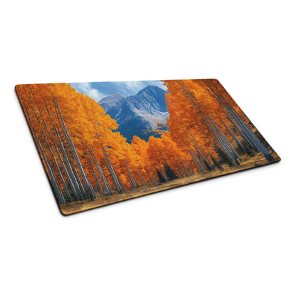 Vibrant autumn forest gaming mouse pad with orange aspen trees and mountain scene