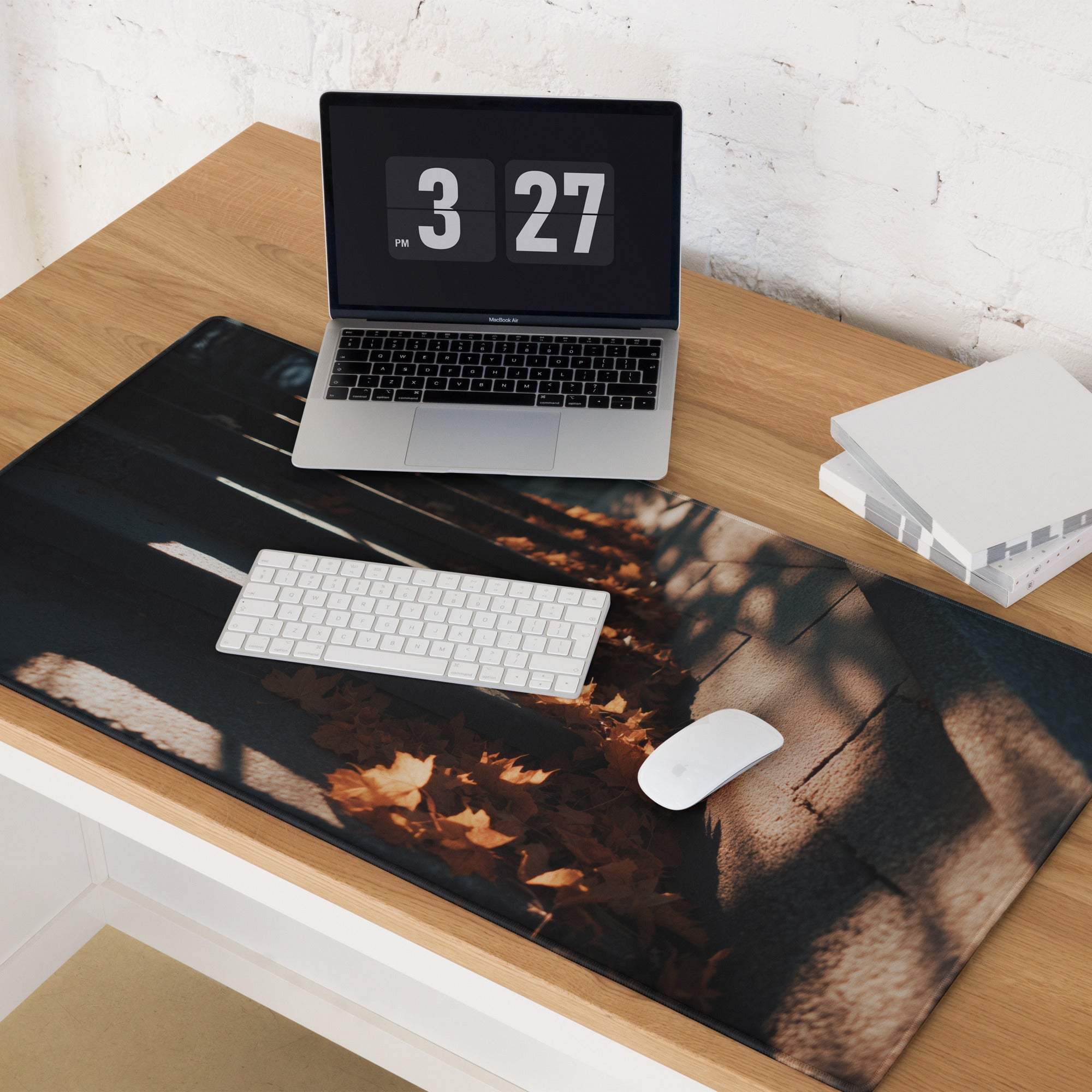 Black rectangular gaming mousepad with autumn leaves and wood design
