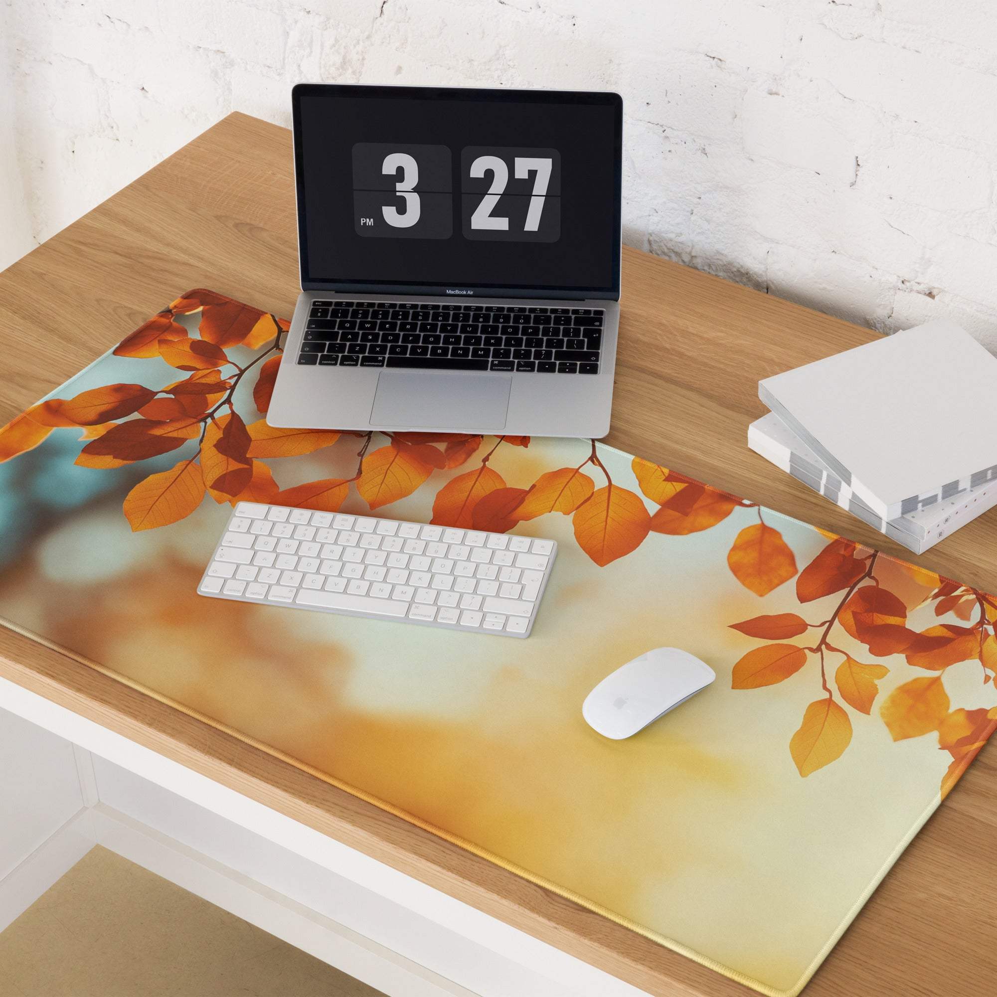 Autumn leaves gaming mouse pad with orange sunset design on large desk mat