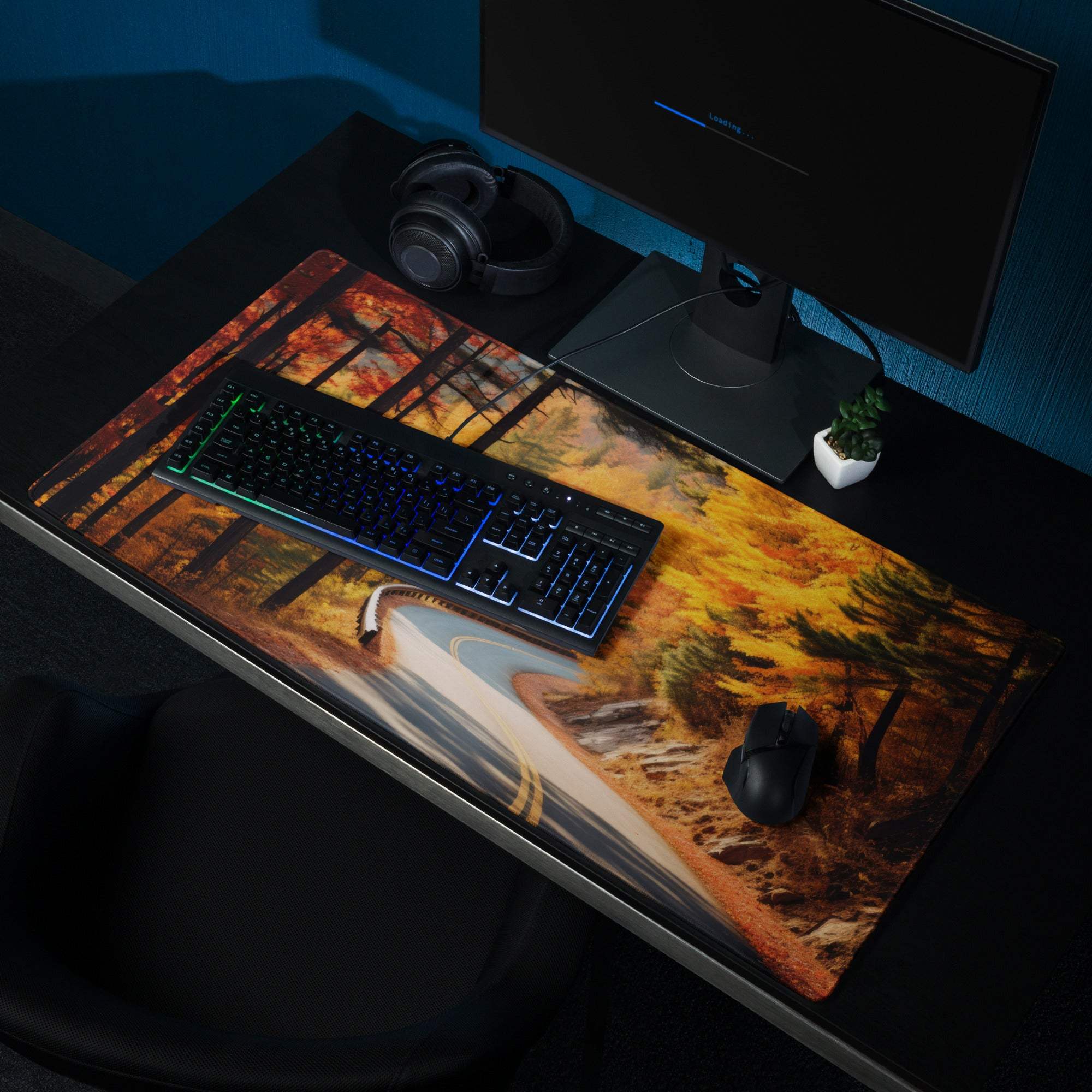 Vibrant autumn forest road gaming mouse pad with warm hues and non-slip edges