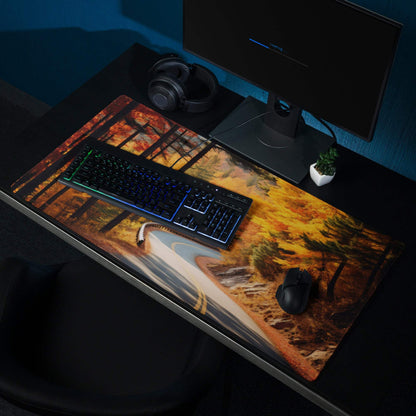 Vibrant autumn forest road gaming mouse pad with warm hues and non-slip edges