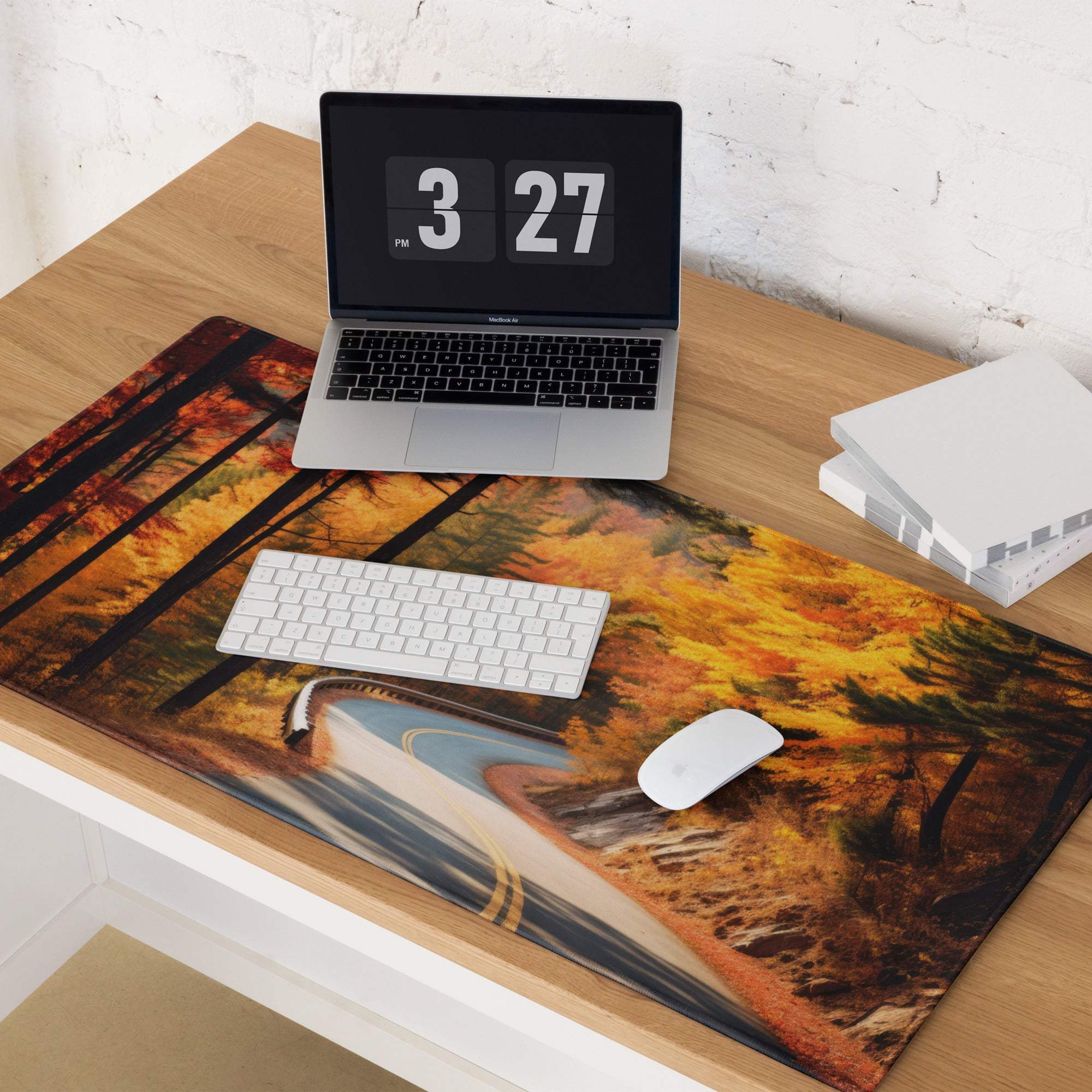 Vibrant autumn forest road gaming mouse pad with orange foliage