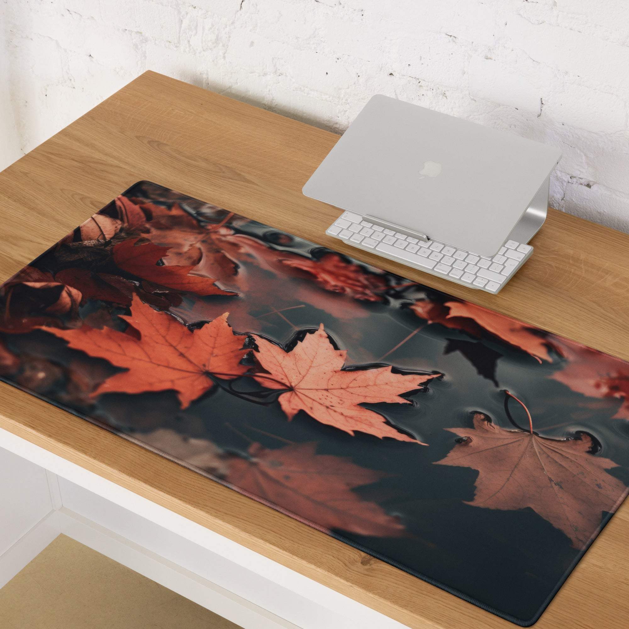 Autumn leaves gaming mouse pad with vivid orange red maple leaves on dark water