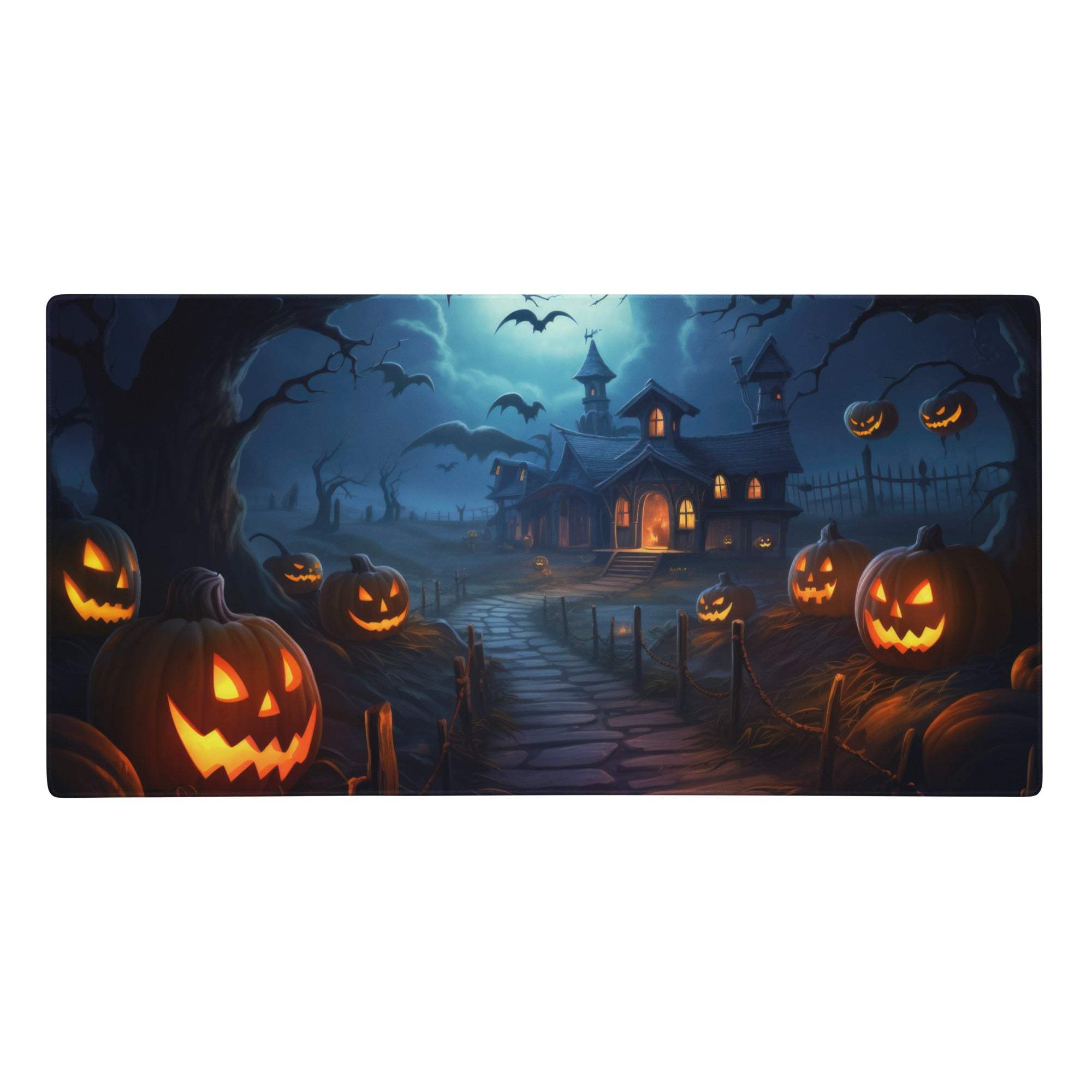 Haunted halloween nightscape desk pad featuring a spooky haunted house with glowing orange jack o lanterns and bats on dark blue background