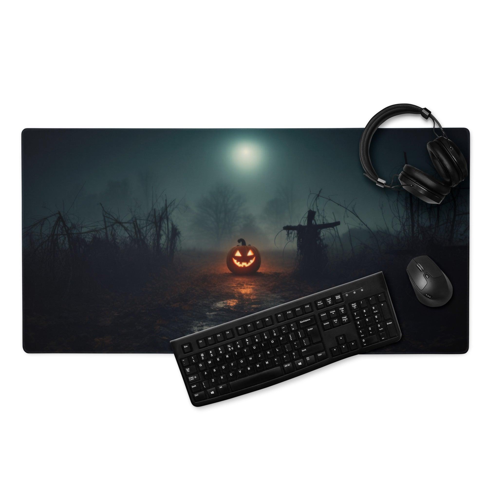 Halloween gaming mouse pad with glowing pumpkin under moon, scarecrows, misty field