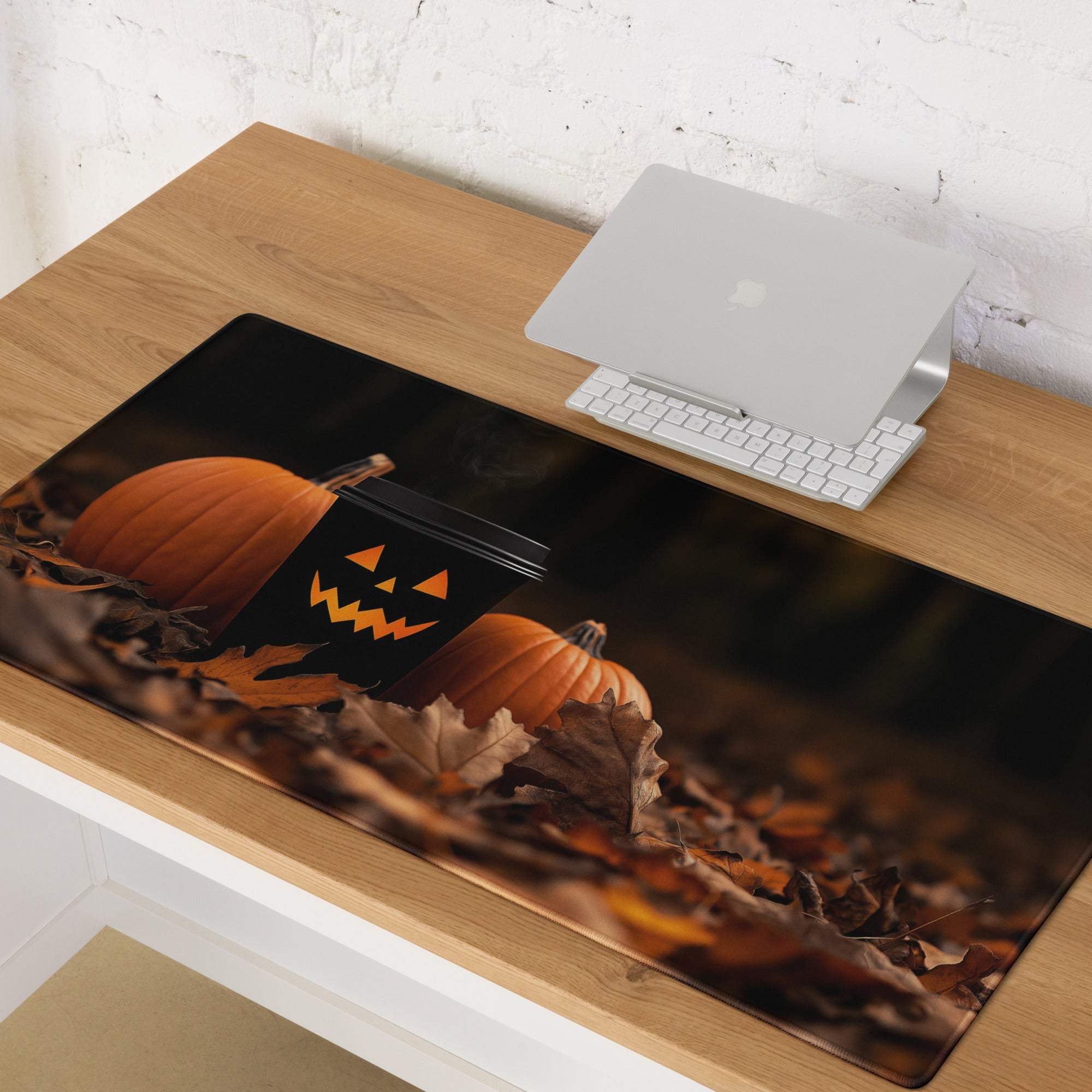 Black Halloween gaming mousepad with orange pumpkins and jack-o-lantern
