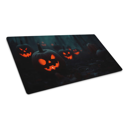 Black rectangular Halloween gaming mousepad with glowing orange jack-o-lanterns in spooky forest
