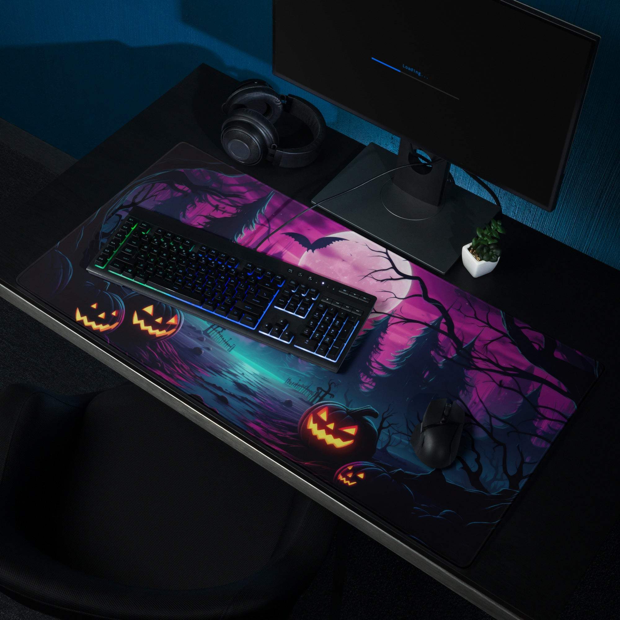 Neon Halloween forest gaming mouse pad with purple teal glow, jack-o-lanterns, bats