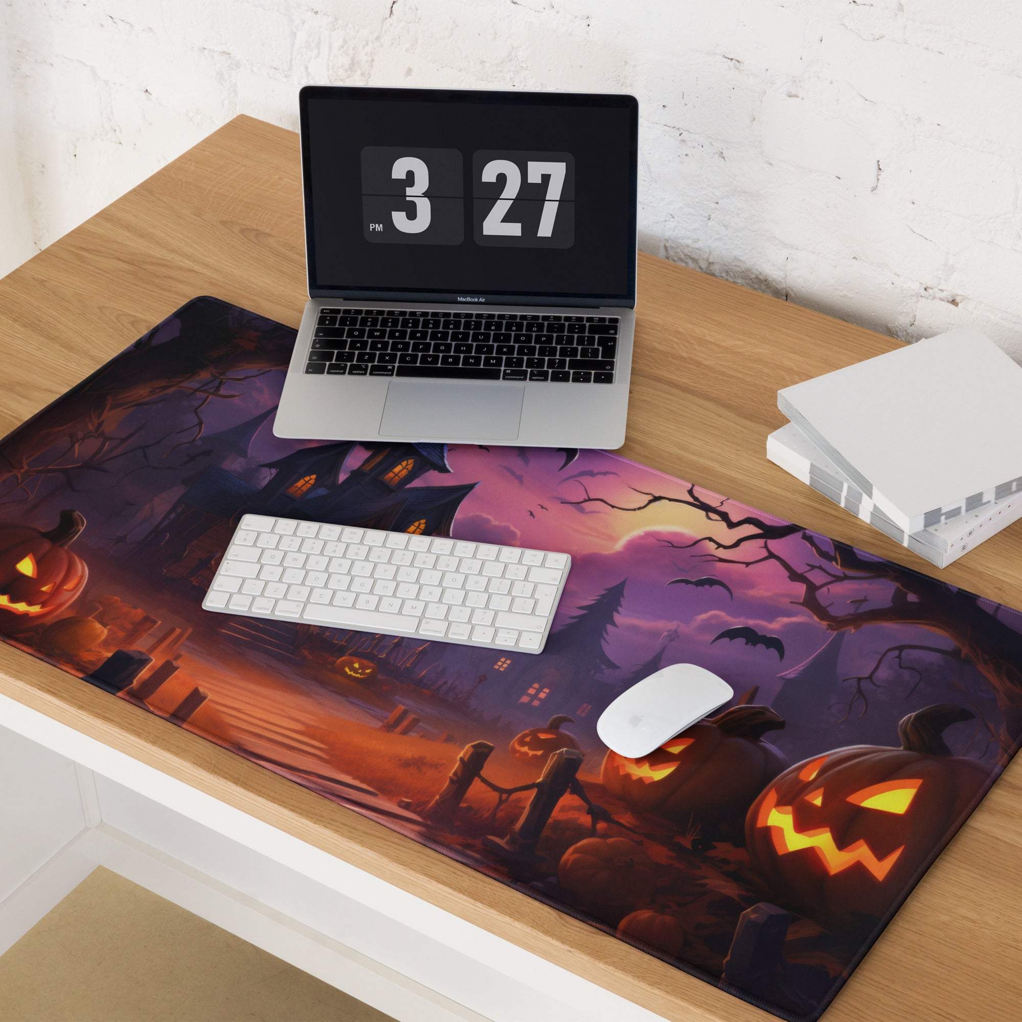 Spooky Halloween haunted house gaming mouse pad with glowing jack-o-lanterns bats purple orange sky