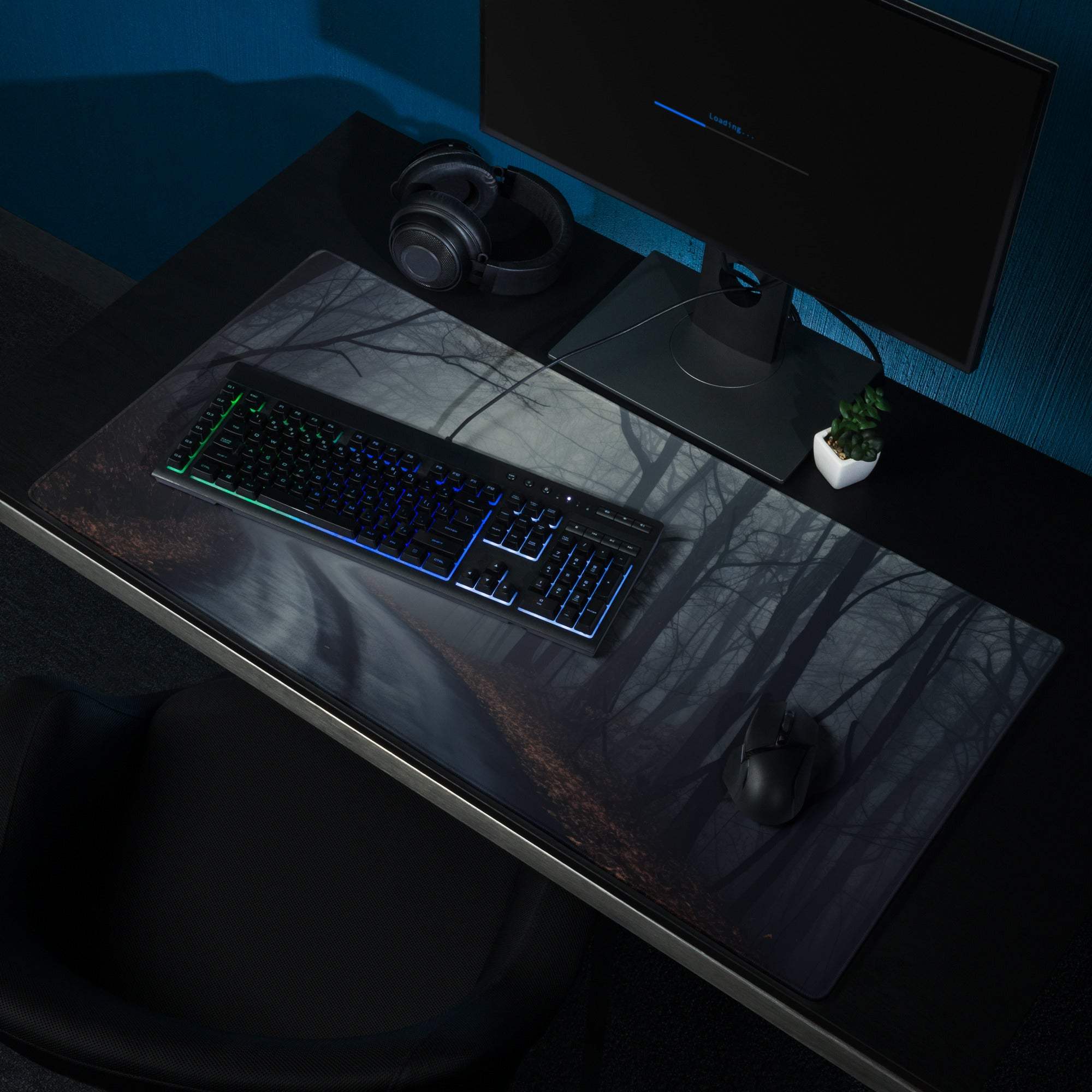 Dark gray forest gaming mousepad with matte finish, non-slip base, stitched edges