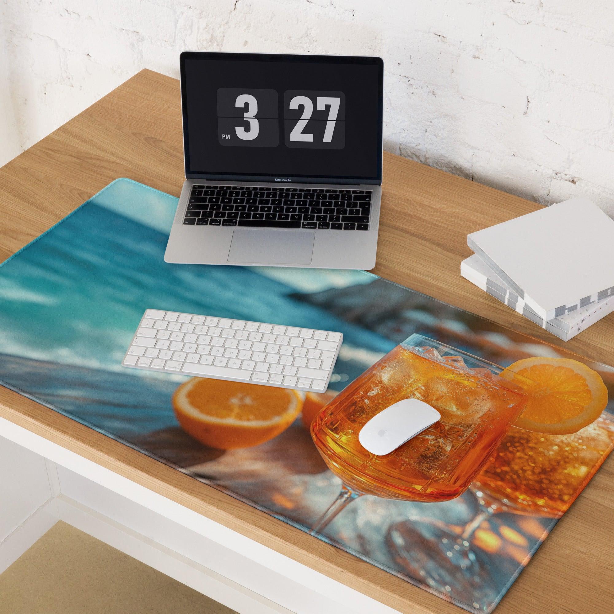 Blue ocean desk mat with vibrant cocktail, orange slice, non-slip base, edge stitching