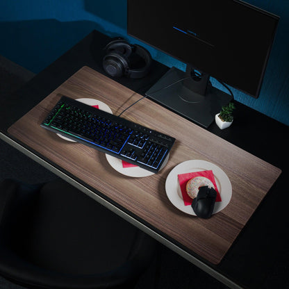 Black RGB gaming keyboard on wood grain brown large mouse pad