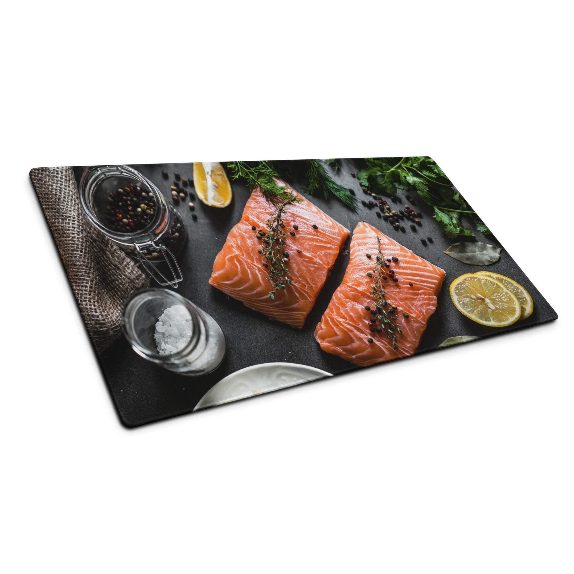 Black gaming mouse pad with salmon fillets, herbs, lemon, peppercorns image