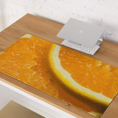 Vibrant orange slice gaming mouse pad with glossy finish and non-slip base