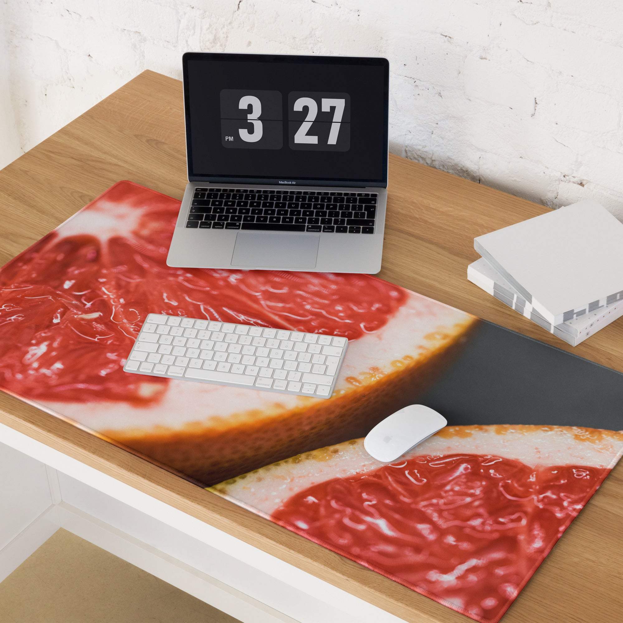 Vibrant red white grapefruit gaming mouse pad with glossy pulp texture