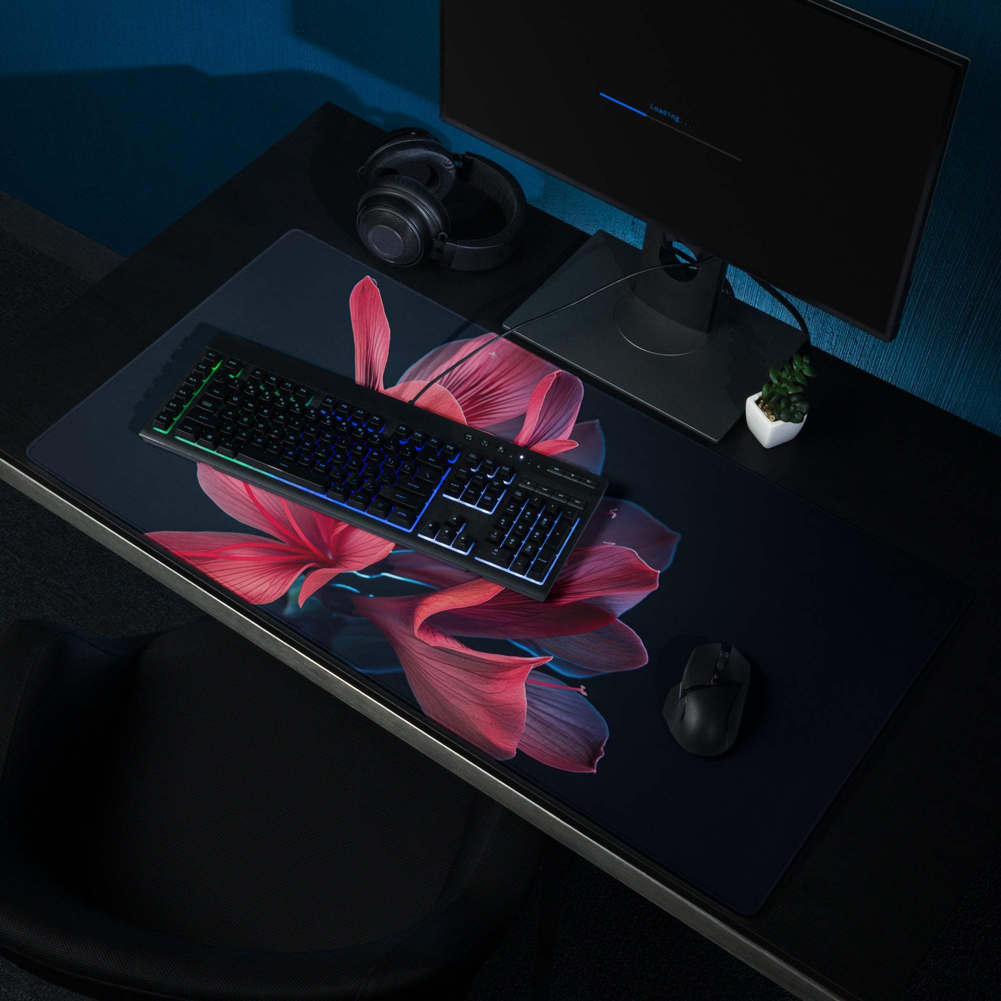 Black mousepad with vibrant pink purple floral design and non-slip backing