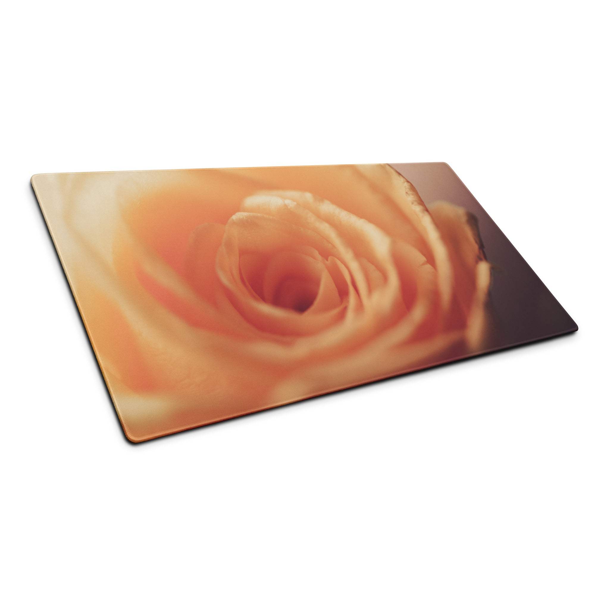 Close-up orange rose on glass cutting board, peach rose gaming mouse pad design