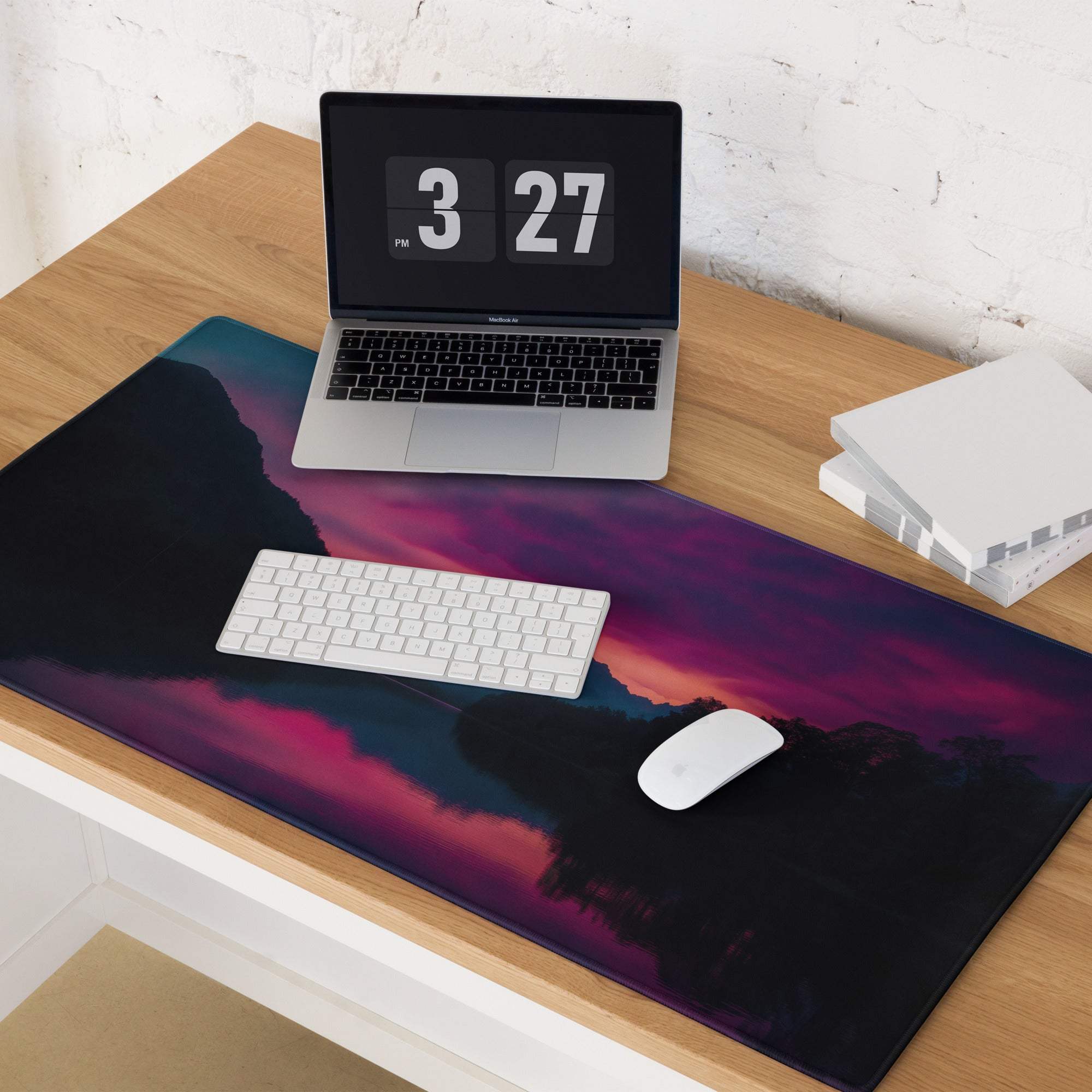 Vibrant purple black epic sunset mountain desk mat with non-slip base
