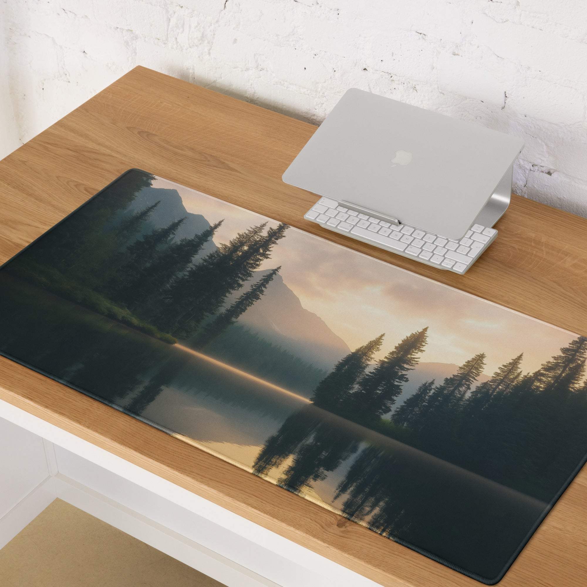 Nature-inspired gaming mouse pad with misty lake reflections and warm sunrise tones