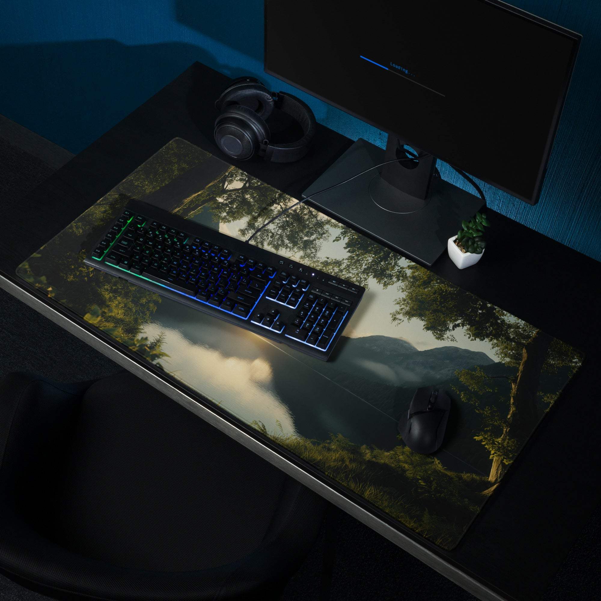 Black keyboard on Serene Sunset forest landscape gaming mouse pad
