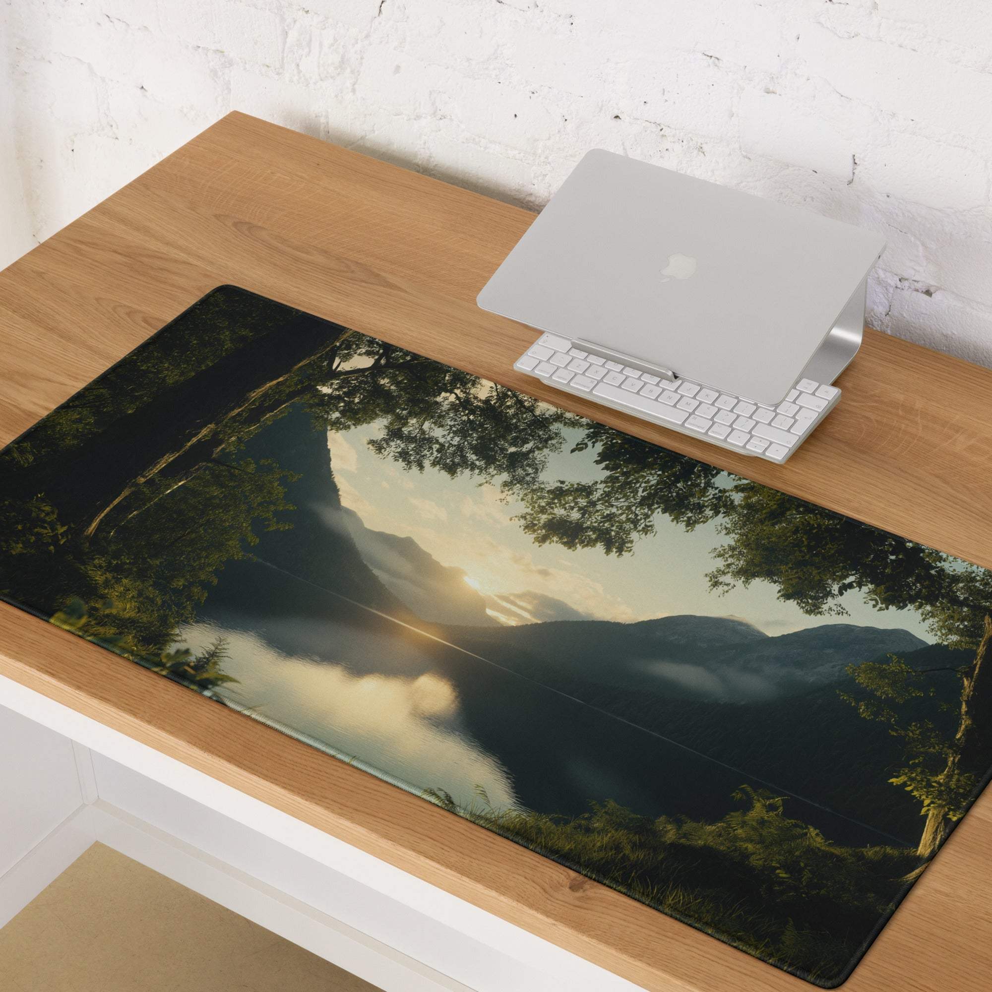 Serene sunset landscape gaming mouse pad with mountains, trees, water reflection