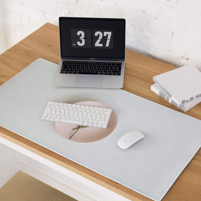 Sleek gray gaming mousepad with pink floral cutout and non-slip base