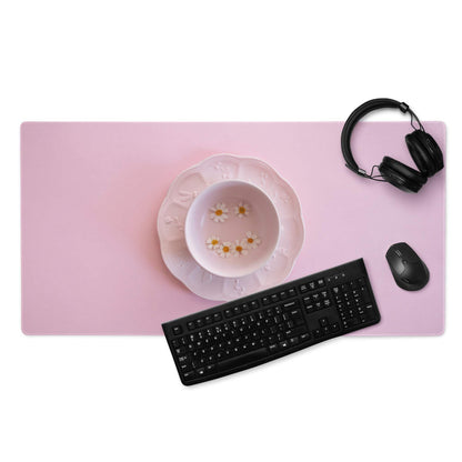Pink rectangular gaming mouse pad with matte finish and non-slip backing