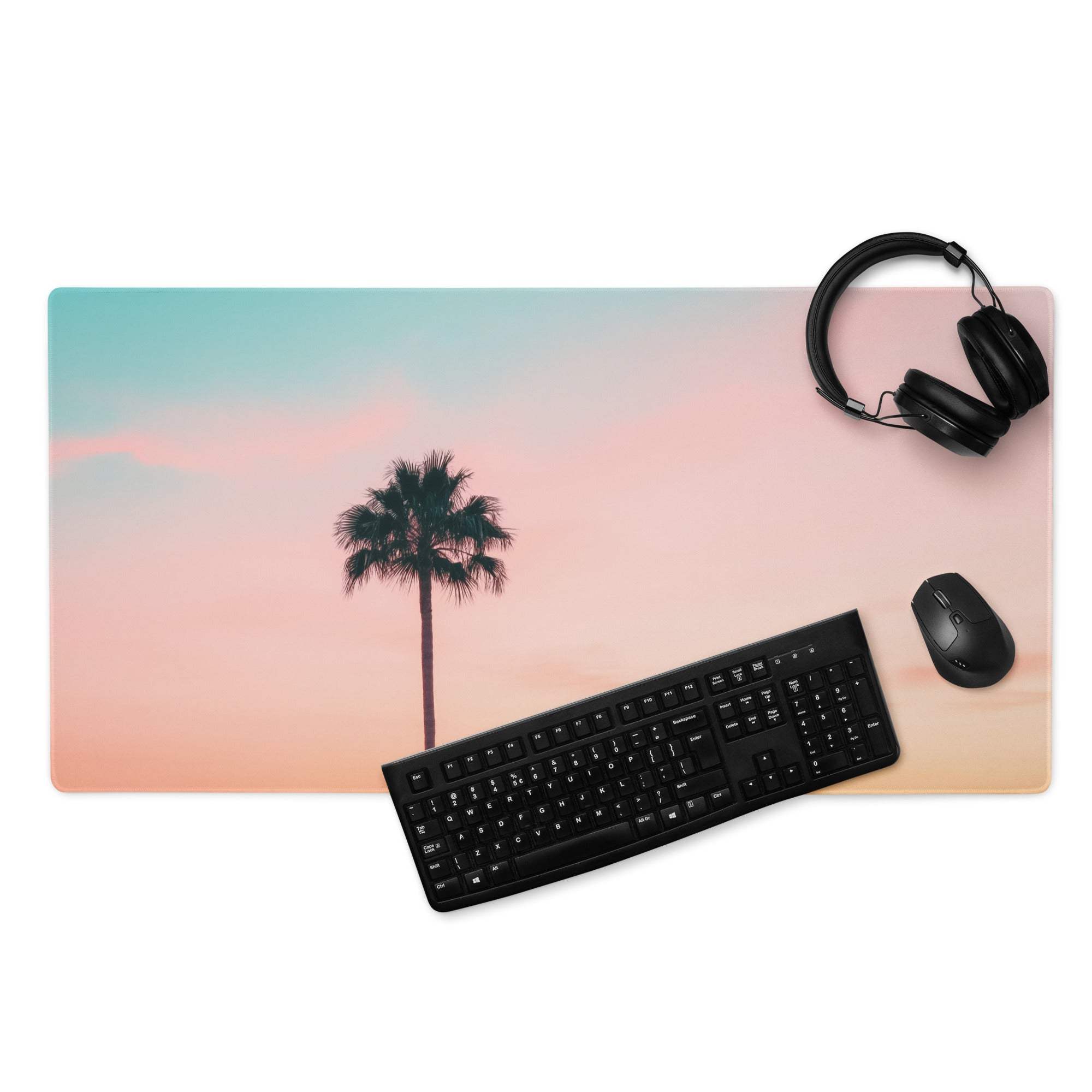 Pastel sunset palm tree gaming mouse pad with pink teal gradient and non-slip base