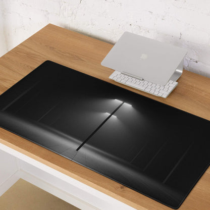 Black ergonomic keyboard tray with glossy finish on large gaming mouse pad