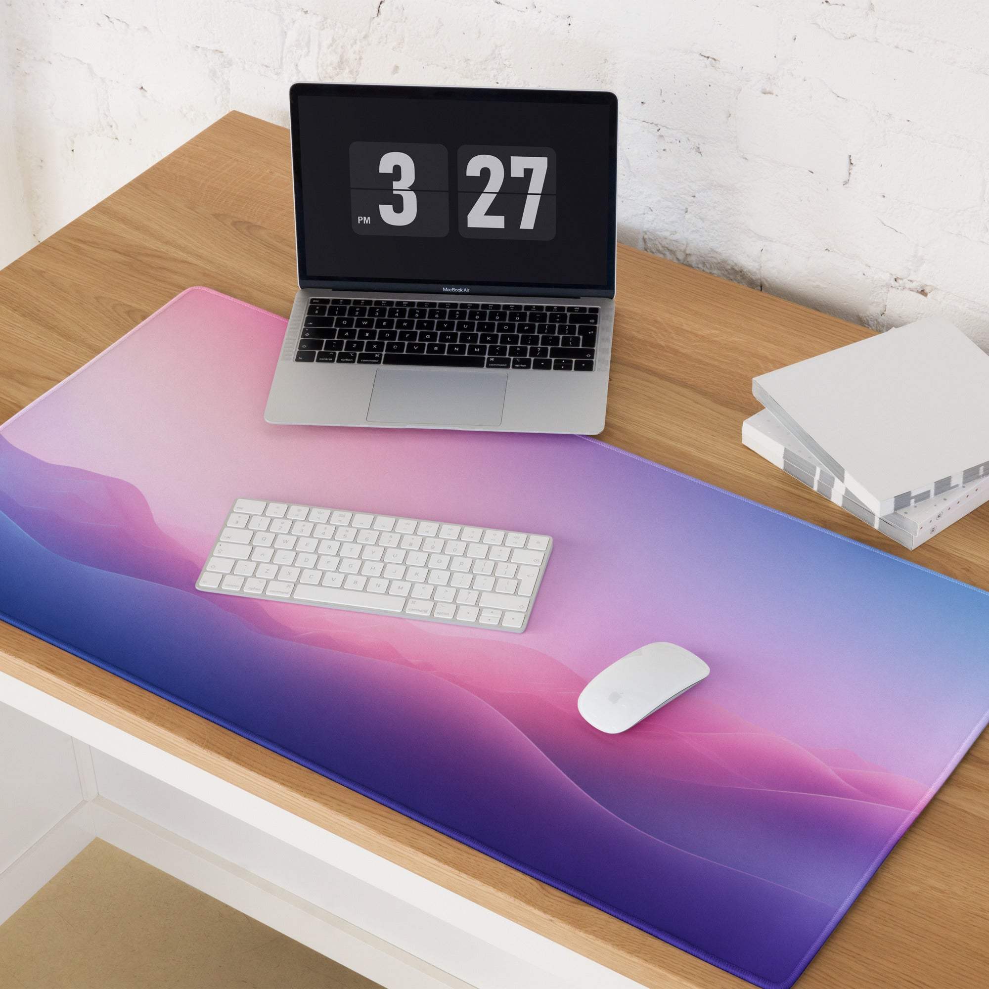 Vibrant pink-to-purple gradient stitched gaming mouse pad with non-slip base
