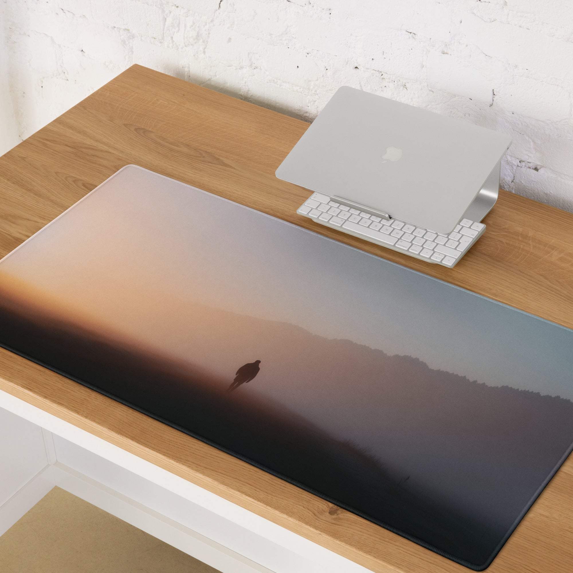 Sleek immersive sunset gradient gaming mouse pad with large non-slip base and edge stitching