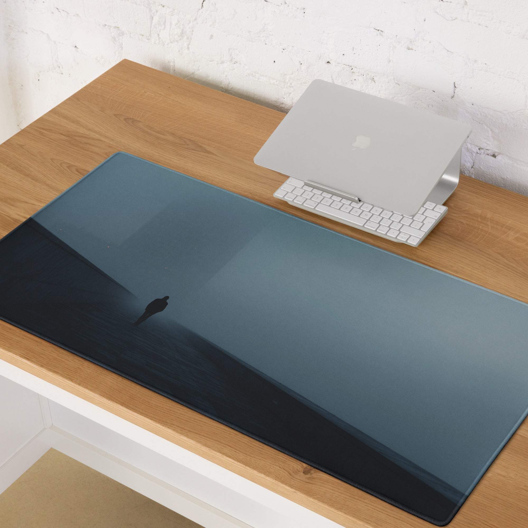 Sleek gradient blue Moody Blue Mist gaming mouse pad with minimalist silhouette