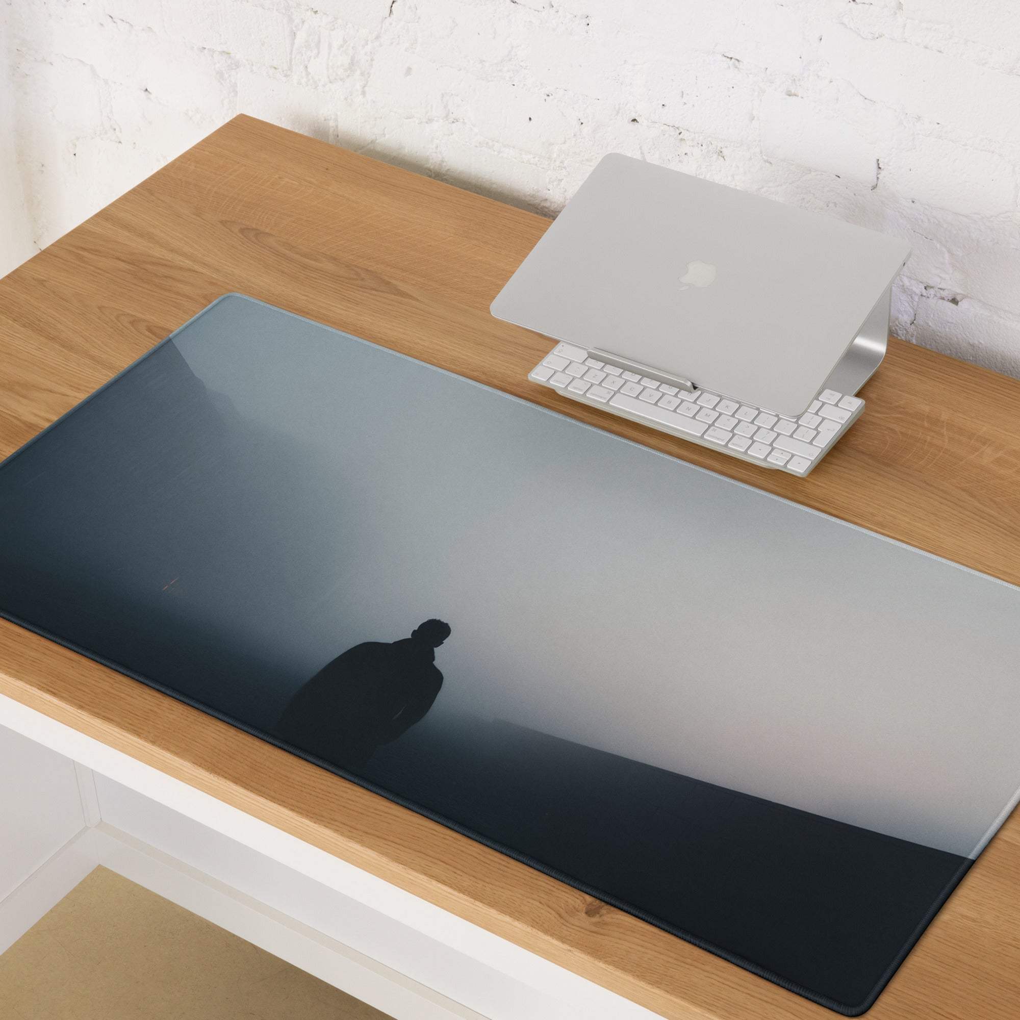 Moody blue gray gaming mouse pad with misty mountain silhouette